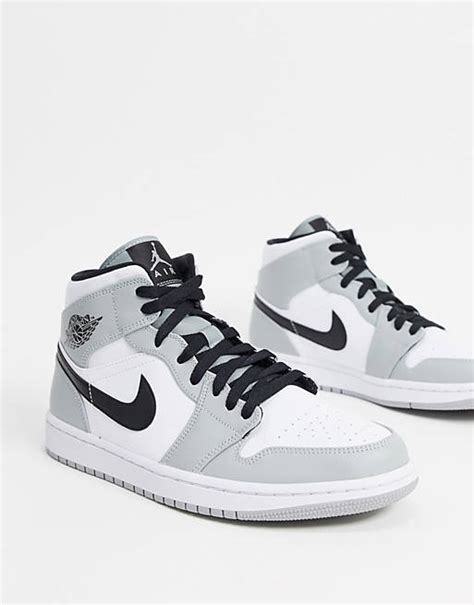 nike - air jordan 1 - halfhoge sneakers in grijs/wit